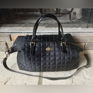 Kate Spade Black Quilted Travel Bag with Patent Handles and Shoulder Strap